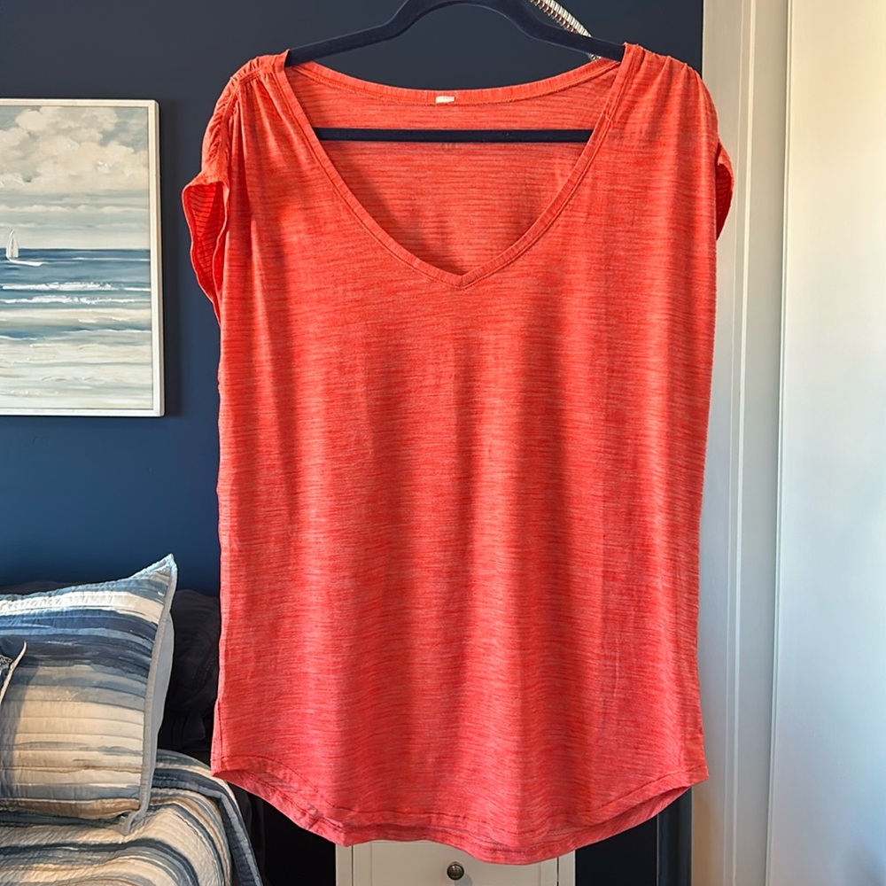 Orange Lululemon sleeveless top. L